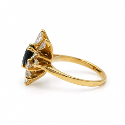 Bague 48 Bague Marguerite en or jaune 750‰, saphir et diamants 58 Facettes 260290R