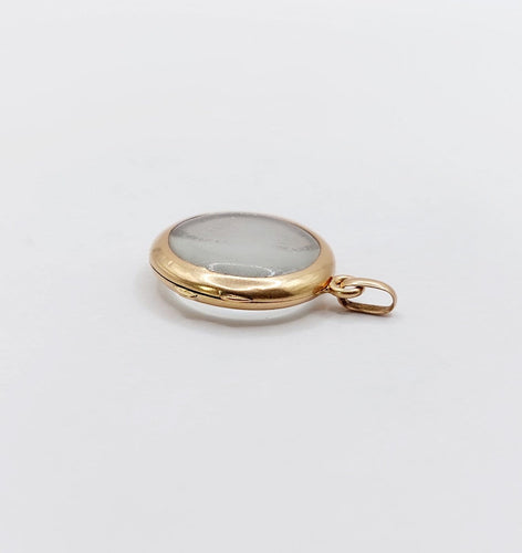 Pendentif Pendentif porte-photo reliquaire en or rose 18k, vers 1900 58 Facettes A07972