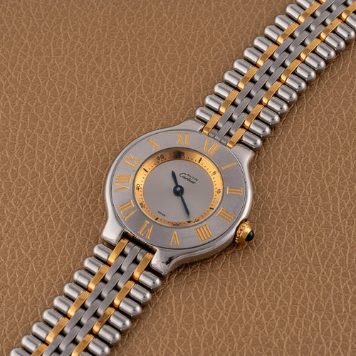 Montre Cartier - Montre Must de 21 à quartz en or et acier 58 Facettes TOT-11918