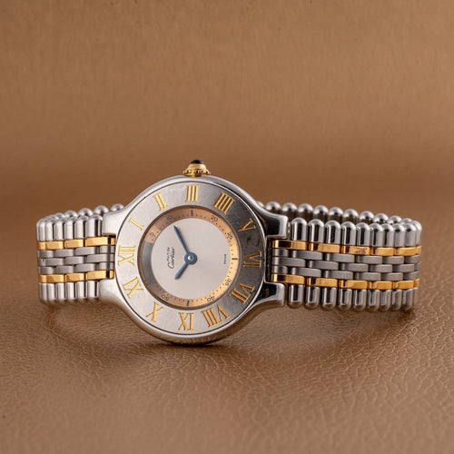 Montre Cartier - Montre Must de 21 à quartz en or et acier 58 Facettes TOT-11918