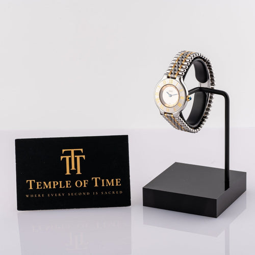 Montre Cartier - Montre Must de 21 à quartz en or et acier 58 Facettes TOT-11918