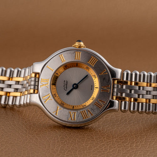Montre Cartier - Montre Must de 21 à quartz en or et acier 58 Facettes TOT-11918