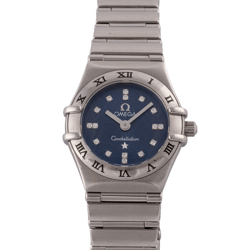Montre Omega Constellation - Montre femme à quartz, acier, cadran bleu, réf. 1563.86.00 58 Facettes TOT-12001