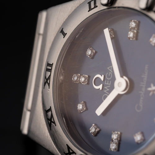 Montre Omega Constellation - Montre femme à quartz, acier, cadran bleu, réf. 1563.86.00 58 Facettes TOT-12001