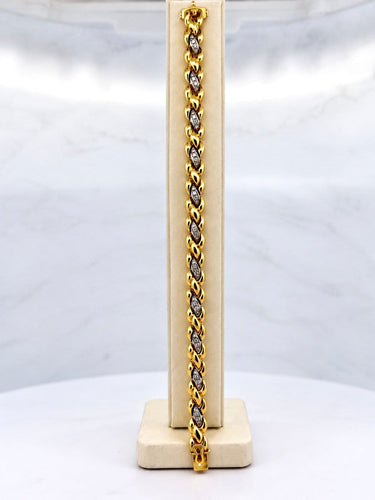 Bracelet Chimento - Bracelet en or jaune et blanc 18 carats avec diamants 58 Facettes 91075