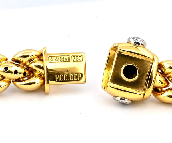 Bracelet Chimento - Bracelet en or jaune et blanc 18 carats avec diamants 58 Facettes 91075