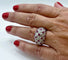 Bague 54 Bague boule en or blanc, rubis et diamants 58 Facettes 325/141