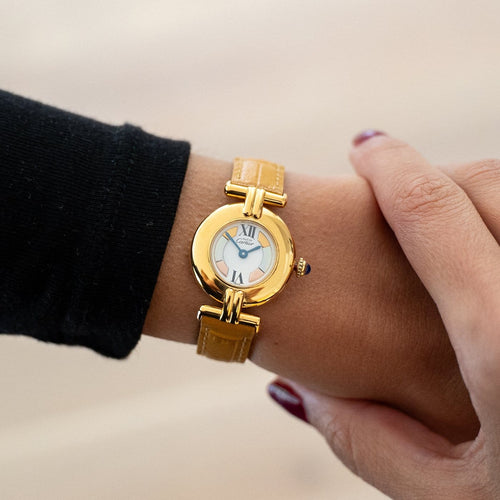 Montre Cartier Must Colisée - Montre à quartz, cadran ivoire Trinity 58 Facettes 600
