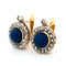 Boucles d'oreilles Boucles d'oreilles cluster en or jaune et blanc 18k, lapis-lazuli et diamants 58 Facettes 9A81F6A510C042D1A0371FE9CE305B2E