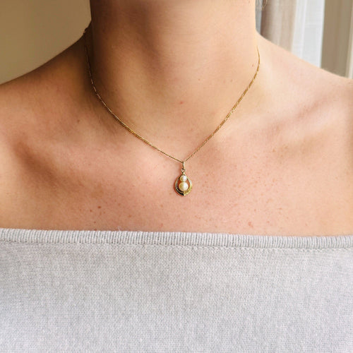 Pendentif Pendentif en or jaune 14k avec deux perles 58 Facettes 2604028