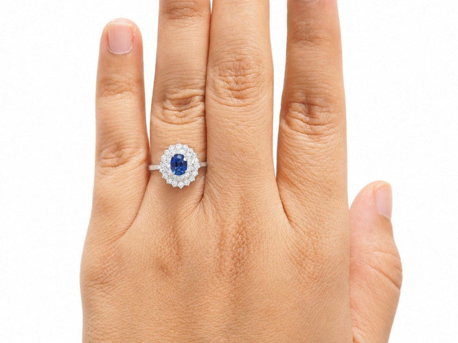 Bague 55 Bague double entourage en or blanc, saphir ovale 0,85 ct et diamants 0,50 ct 58 Facettes 32091