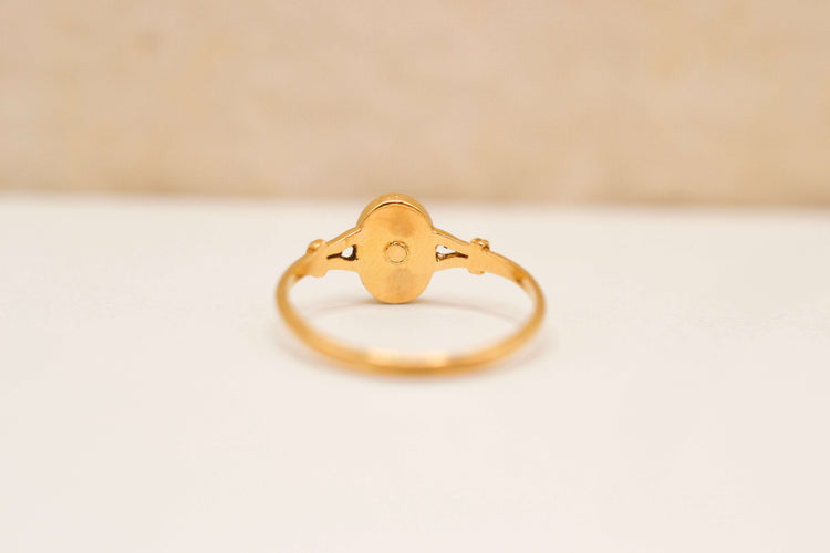 Bague Bague ovale en or jaune 18 carats, onyx et diamant 58 Facettes 4207