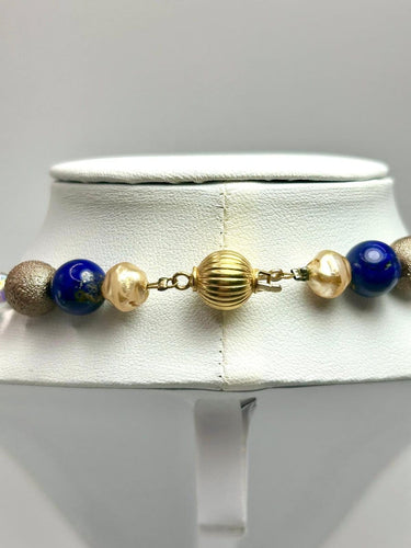 Collier Collier sautoir italien vintage en or 18k et lapis-lazuli 58 Facettes Collana Lapis Lazuli