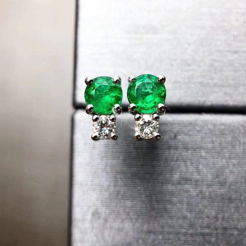 Boucles d'oreilles Boucles d’oreilles tulipe en or blanc 18k, émeraudes et diamants 58 Facettes GER1337GN_20261016