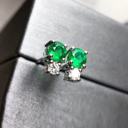 Boucles d'oreilles Boucles d’oreilles tulipe en or blanc 18k, émeraudes et diamants 58 Facettes GER1337GN_20261016