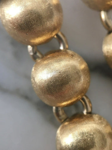 Bracelet Bracelet en or jaune 18k à 21 boules 58 Facettes 308