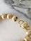 Bracelet Bracelet en or jaune 18k à 21 boules 58 Facettes 308