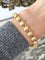 Bracelet Bracelet en or jaune 18k à 21 boules 58 Facettes 308
