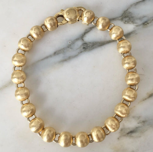 Bracelet Bracelet en or jaune 18k à 21 boules 58 Facettes 308