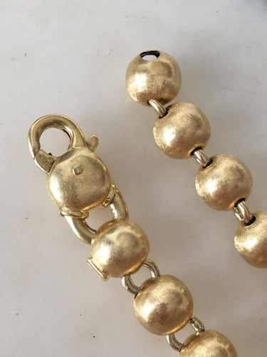 Bracelet Bracelet en or jaune 18k à 21 boules 58 Facettes 308