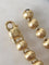 Bracelet Bracelet en or jaune 18k à 21 boules 58 Facettes 308