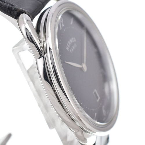 Montre Hermès - Montre Arceau à quartz en acier inoxydable et alligator 58 Facettes k5h5t669n2