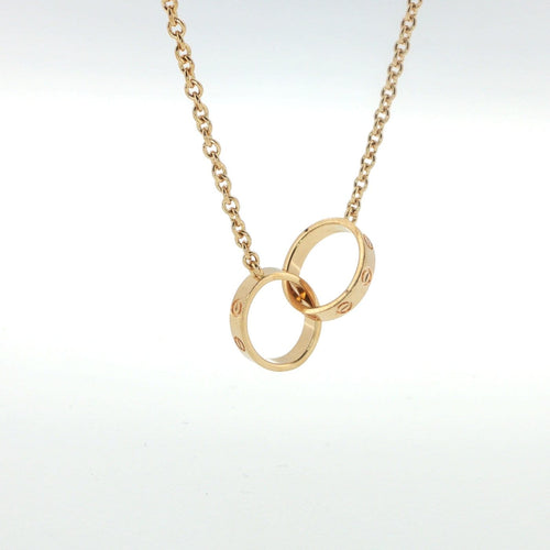 Collier Cartier - Collier LOVE en or jaune 18 carats à deux anneaux entrelacés 58 Facettes UN-1763