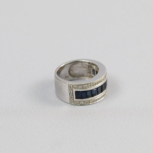 Bague 50 Bague jonc en or blanc 18 carats, saphirs baguette et diamants 58 Facettes