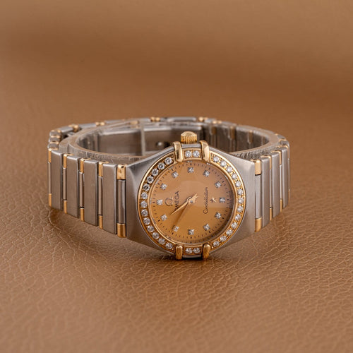 Montre Omega Constellation - Montre quartz en or et acier, 1998 58 Facettes TOT-11995