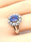 Bague 56 Bague marguerite en or blanc 18 carats, saphir de Ceylan et diamants 58 Facettes AB750