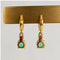 Boucles d'oreilles Boucles d’oreilles créoles en or jaune 18k, turquoise et rubis 58 Facettes 2601016