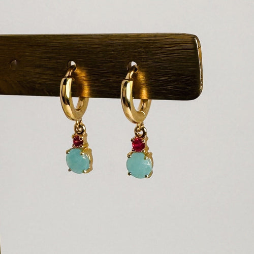 Boucles d'oreilles Boucles d’oreilles créoles en or jaune 18k, turquoise et rubis 58 Facettes 2601016