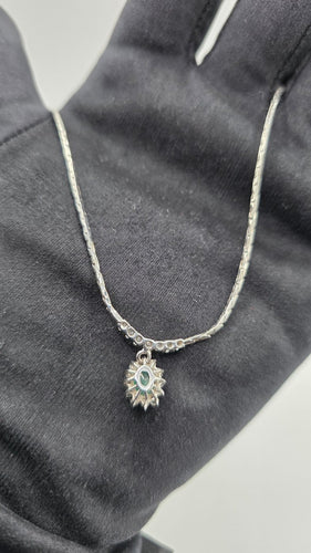 Collier MATY - Collier avec pendentif en or gris 750/1000, émeraude ovale et diamants taille brillant 58 Facettes Collier MATY