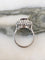 Bague 55.5 Bague marguerite en or blanc 18k, grenat rhodolite et diamants 58 Facettes 313