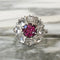Bague 55.5 Bague marguerite en or blanc 18k, grenat rhodolite et diamants 58 Facettes 313