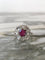 Bague 55.5 Bague marguerite en or blanc 18k, grenat rhodolite et diamants 58 Facettes 313