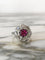 Bague 55.5 Bague marguerite en or blanc 18k, grenat rhodolite et diamants 58 Facettes 313