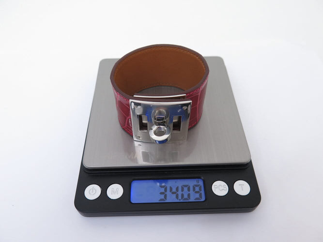 Bracelet Hermès - Bracelet manchette Kelly Dog en cuir d’alligator rouge 58 Facettes 277429