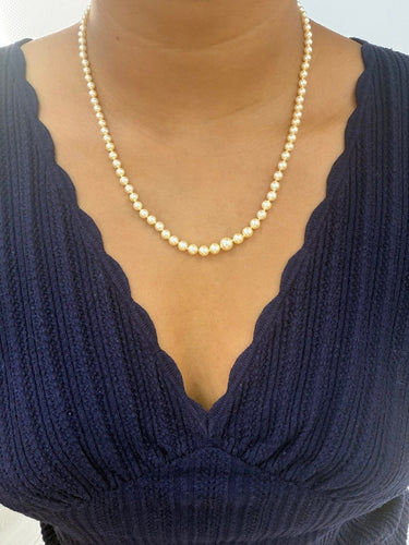 Collier Collier de perles de culture avec fermoir en or jaune 58 Facettes apkda