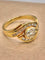 Bague 53.5 Bague vintage torsadée en or jaune 18 carats avec diamant ovale 58 Facettes CV-152