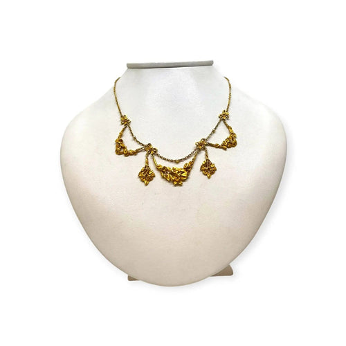Collier Collier à motifs floraux et pampilles en or jaune 750 58 Facettes 330104545
