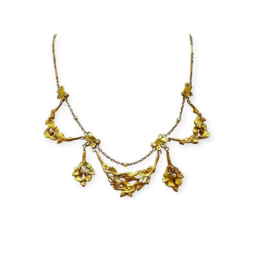 Collier Collier à motifs floraux et pampilles en or jaune 750 58 Facettes 330104545