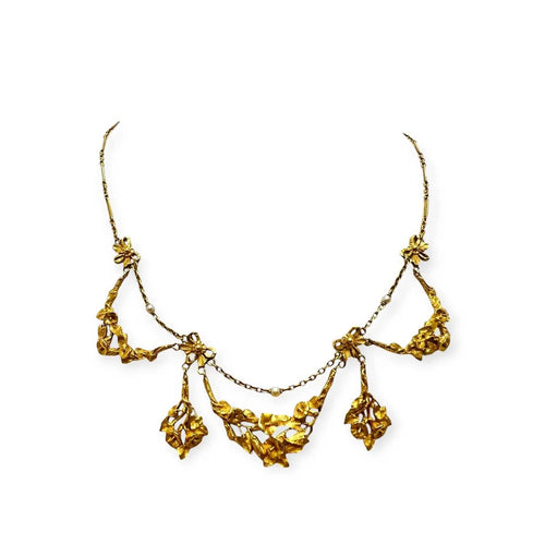 Collier Collier à motifs floraux et pampilles en or jaune 750 58 Facettes 330104545
