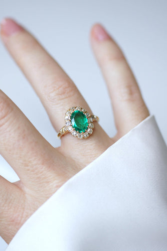 Bague 55 Bague marguerite ancienne en or jaune 18k, émeraude de Colombie et diamants 58 Facettes