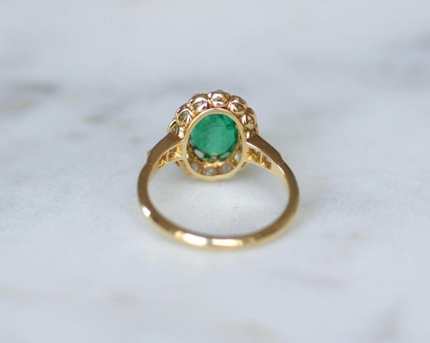 Bague 55 Bague marguerite ancienne en or jaune 18k, émeraude de Colombie et diamants 58 Facettes