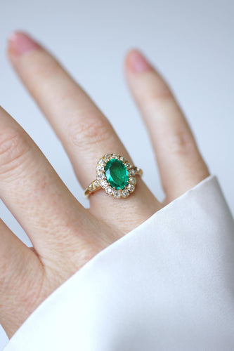 Bague 55 Bague marguerite ancienne en or jaune 18k, émeraude de Colombie et diamants 58 Facettes