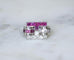 Bague 56 Bague chevalière Art déco en platine, rubis birmans et diamants 58 Facettes