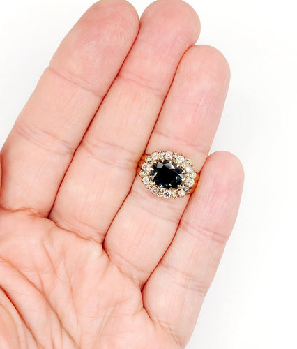 Bague 52 Bague marguerite en or rose, saphir naturel et diamants, vers 1900 58 Facettes A08011
