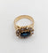Bague 52 Bague marguerite en or rose, saphir naturel et diamants, vers 1900 58 Facettes A08011