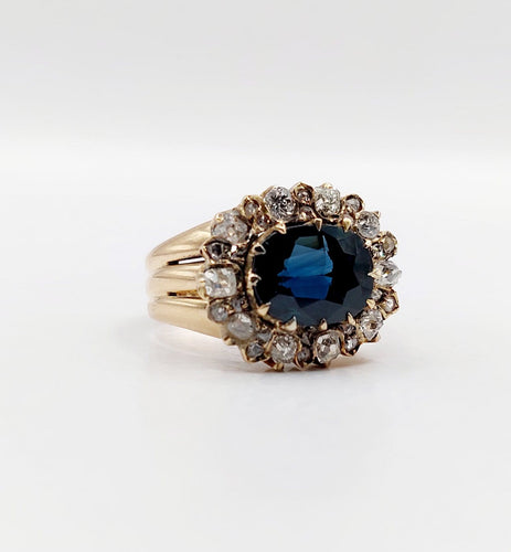 Bague 52 Bague marguerite en or rose, saphir naturel et diamants, vers 1900 58 Facettes A08011
